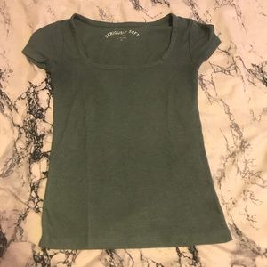 green scoop neck shirt